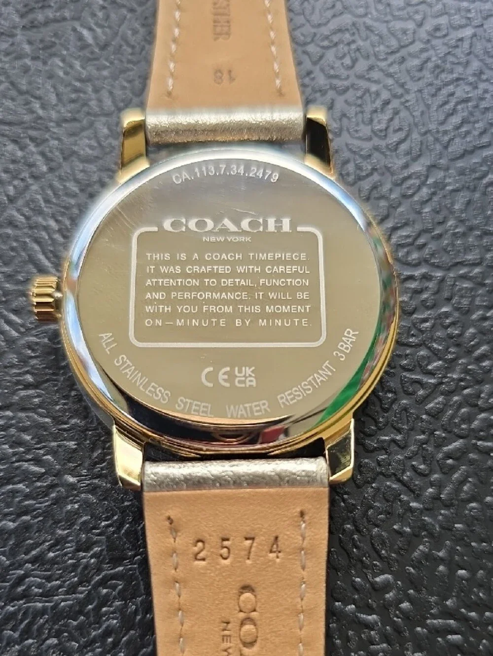 Coach Womens Gold Glitter Dial Watch with Gold-Tone Leather Strap. New Battery.